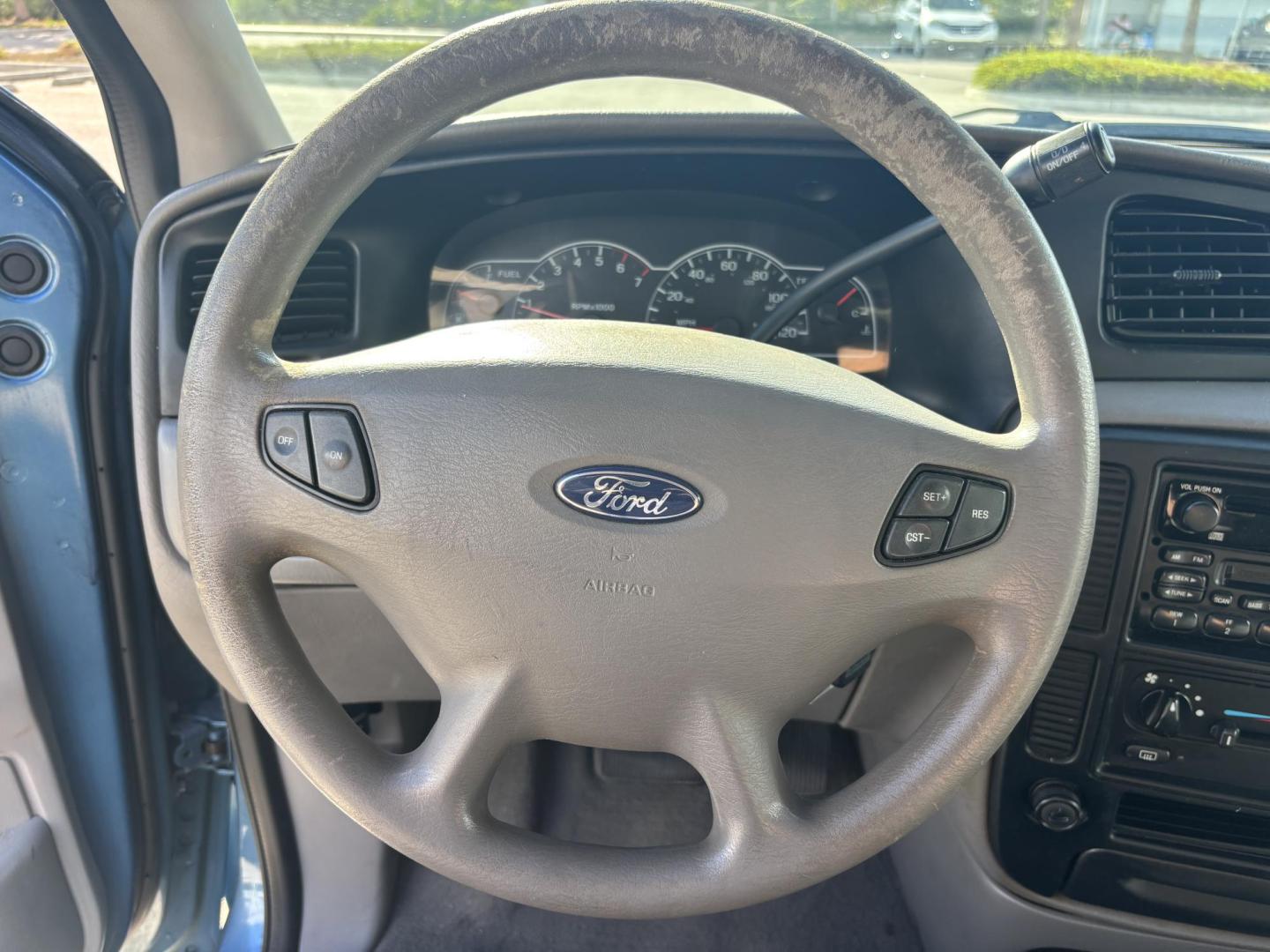 2002 BLUE /GREY CLOTH Ford Windstar LX (2FMZA51422B) with an 3.8L V6 OHV 12V engine, 4-Speed Automatic Overdrive transmission, located at 11170 Summerlin Square Dr., Fort Myers Beach, FL, 33931, (239) 999-7777, 26.493546, -81.941628 - Photo#22