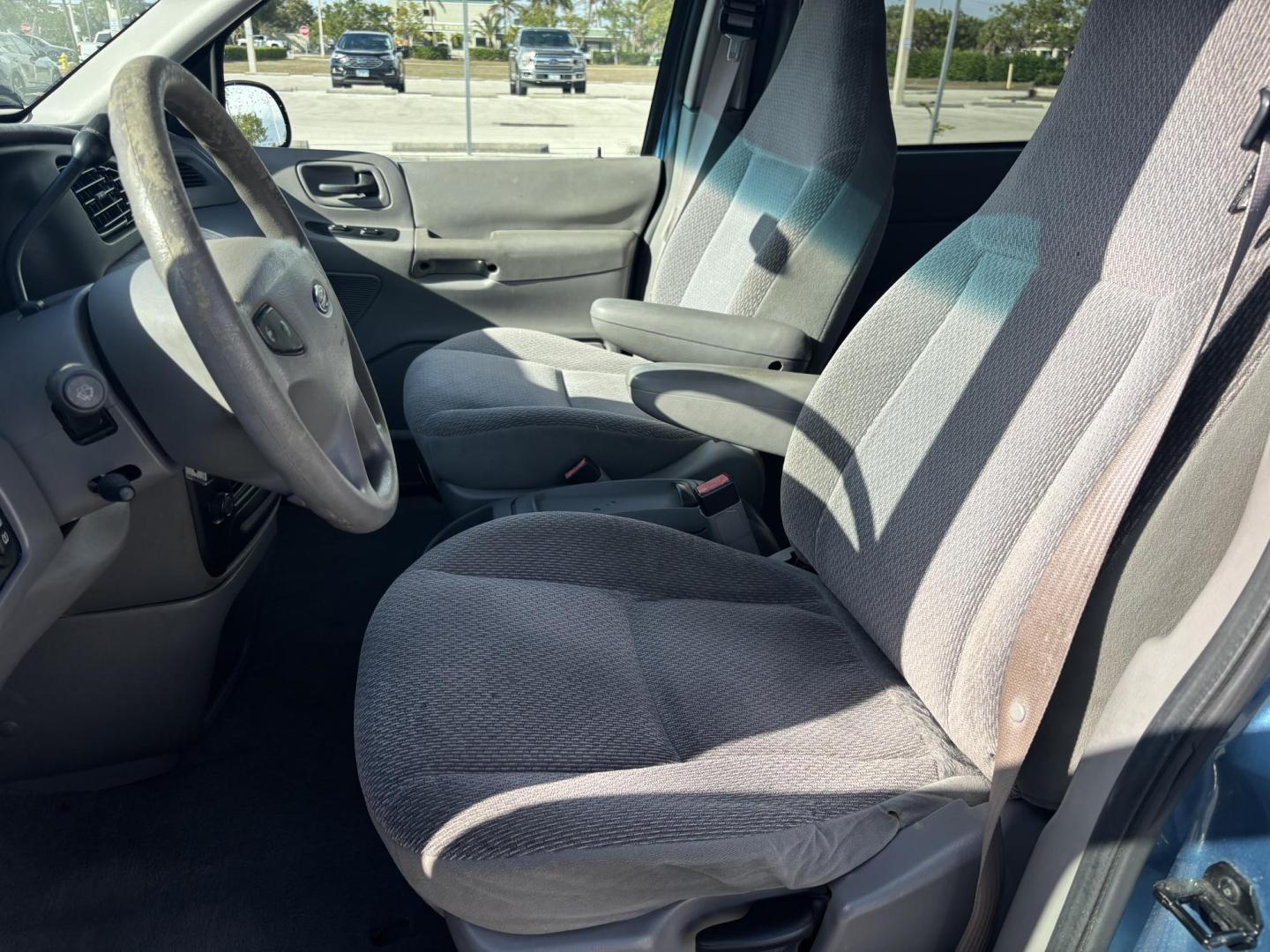 2002 BLUE /GREY CLOTH Ford Windstar LX (2FMZA51422B) with an 3.8L V6 OHV 12V engine, 4-Speed Automatic Overdrive transmission, located at 11170 Summerlin Square Dr., Fort Myers Beach, FL, 33931, (239) 999-7777, 26.493546, -81.941628 - Photo#11