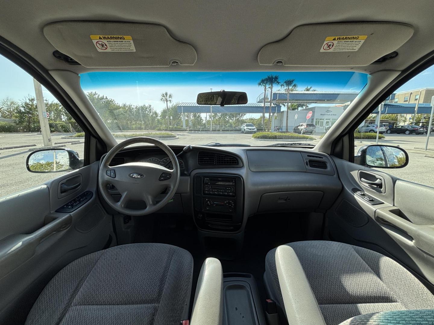 2002 BLUE /GREY CLOTH Ford Windstar LX (2FMZA51422B) with an 3.8L V6 OHV 12V engine, 4-Speed Automatic Overdrive transmission, located at 11170 Summerlin Square Dr., Fort Myers Beach, FL, 33931, (239) 999-7777, 26.493546, -81.941628 - Photo#9