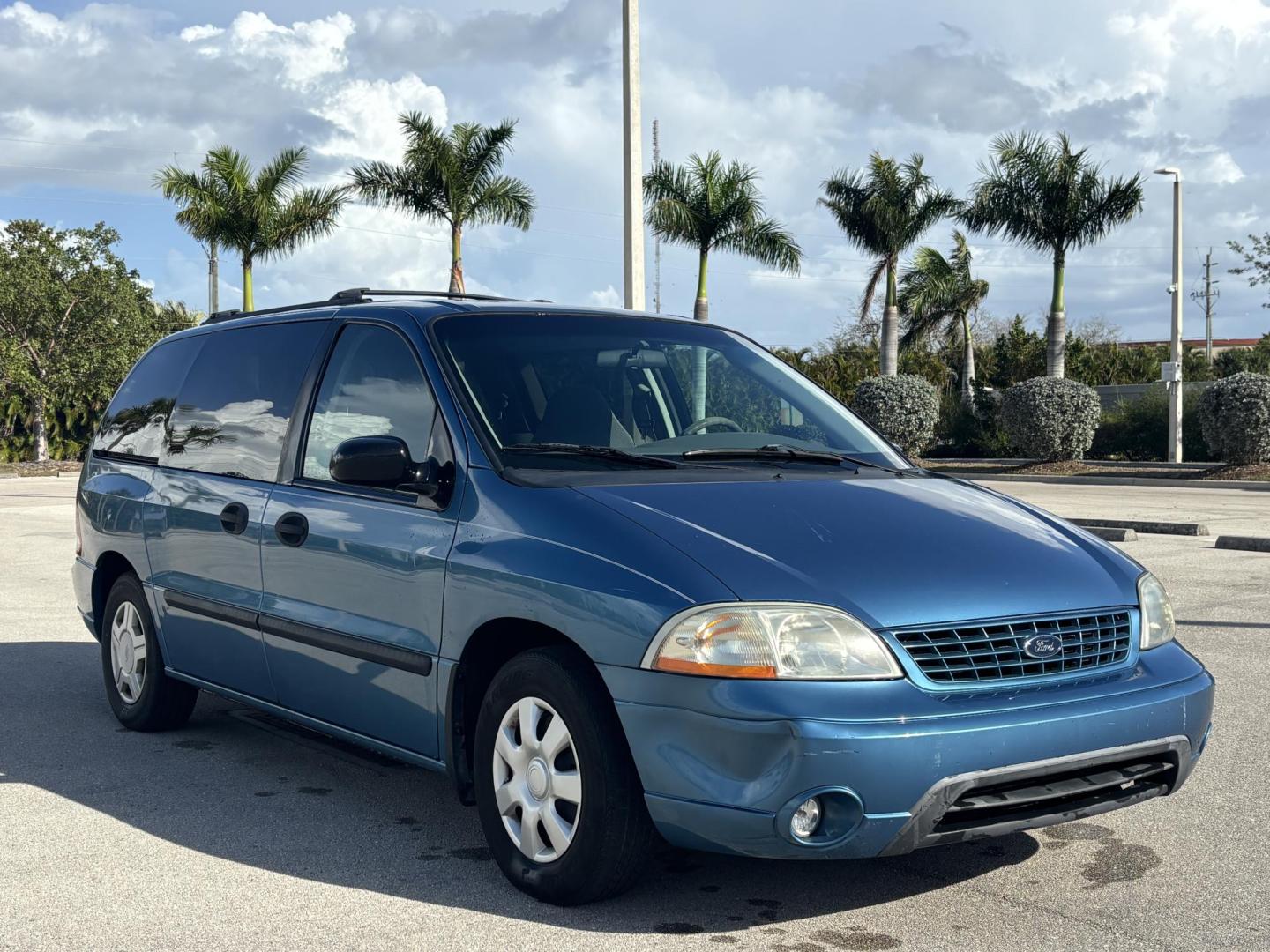 2002 BLUE /GREY CLOTH Ford Windstar LX (2FMZA51422B) with an 3.8L V6 OHV 12V engine, 4-Speed Automatic Overdrive transmission, located at 11170 Summerlin Square Dr., Fort Myers Beach, FL, 33931, (239) 999-7777, 26.493546, -81.941628 - Photo#3