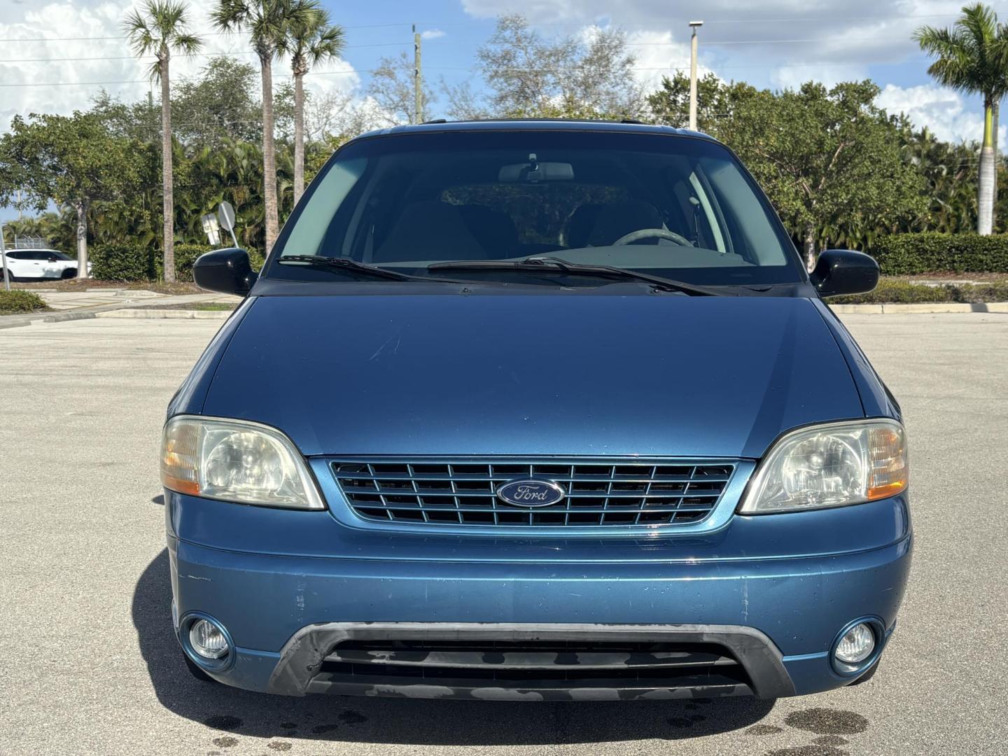 2002 BLUE /GREY CLOTH Ford Windstar LX (2FMZA51422B) with an 3.8L V6 OHV 12V engine, 4-Speed Automatic Overdrive transmission, located at 11170 Summerlin Square Dr., Fort Myers Beach, FL, 33931, (239) 999-7777, 26.493546, -81.941628 - Photo#2