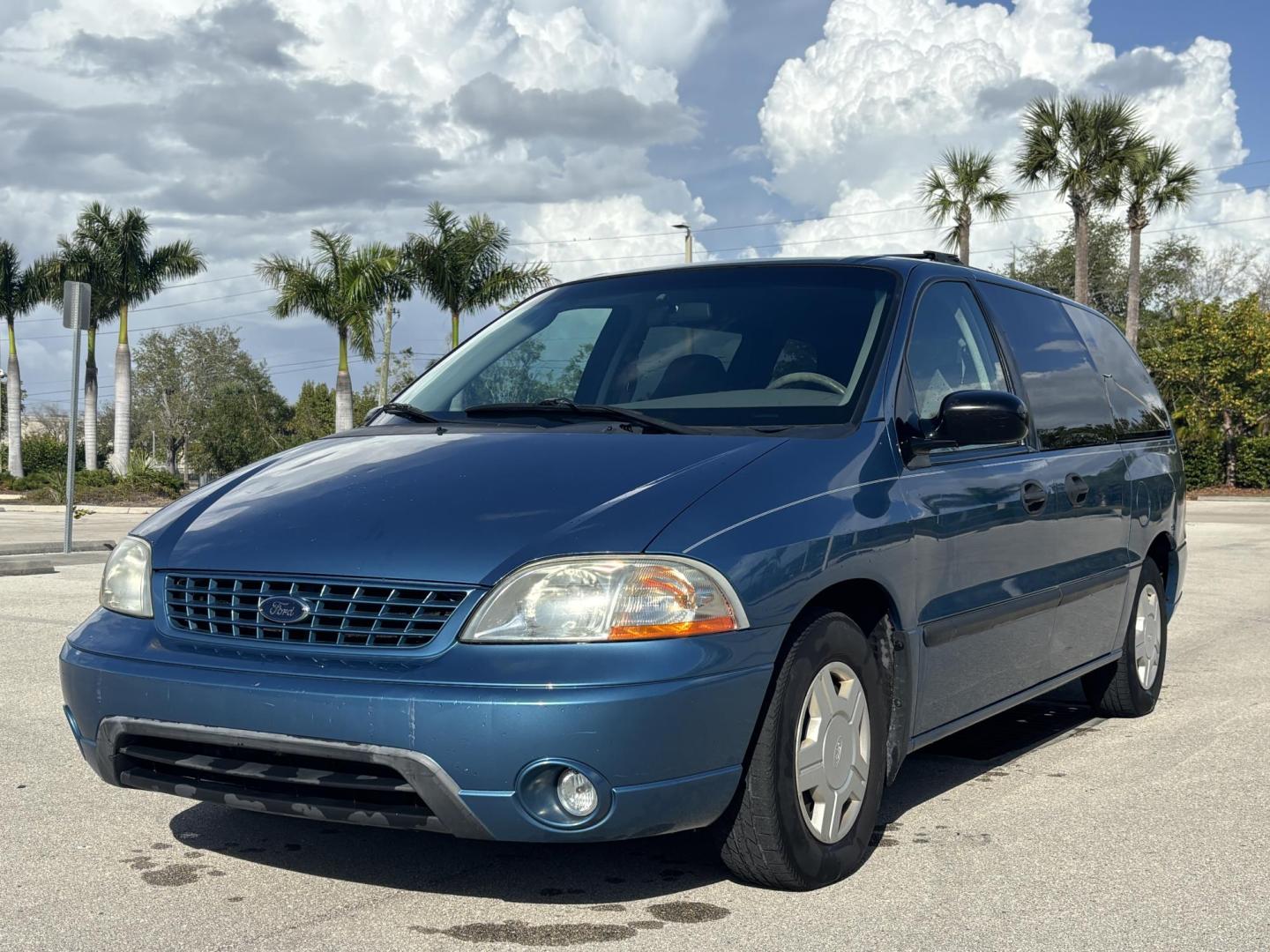 2002 BLUE /GREY CLOTH Ford Windstar LX (2FMZA51422B) with an 3.8L V6 OHV 12V engine, 4-Speed Automatic Overdrive transmission, located at 11170 Summerlin Square Dr., Fort Myers Beach, FL, 33931, (239) 999-7777, 26.493546, -81.941628 - Photo#1