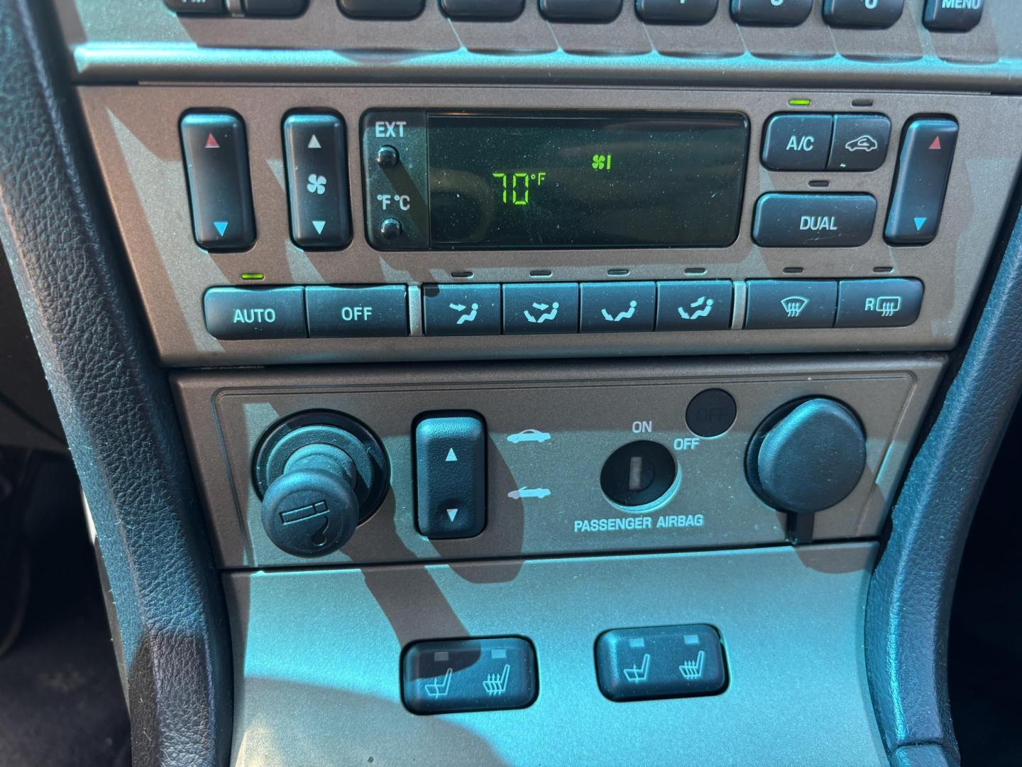 2004 MAROON /BEIGE LEATHER Ford Thunderbird Deluxe (1FAHP60A04Y) with an 3.9L V8 DOHC 32V engine, 5-Speed Automatic Overdrive transmission, located at 11170 Summerlin Square Dr., Fort Myers Beach, FL, 33931, (239) 999-7777, 26.493546, -81.941628 - Photo#43