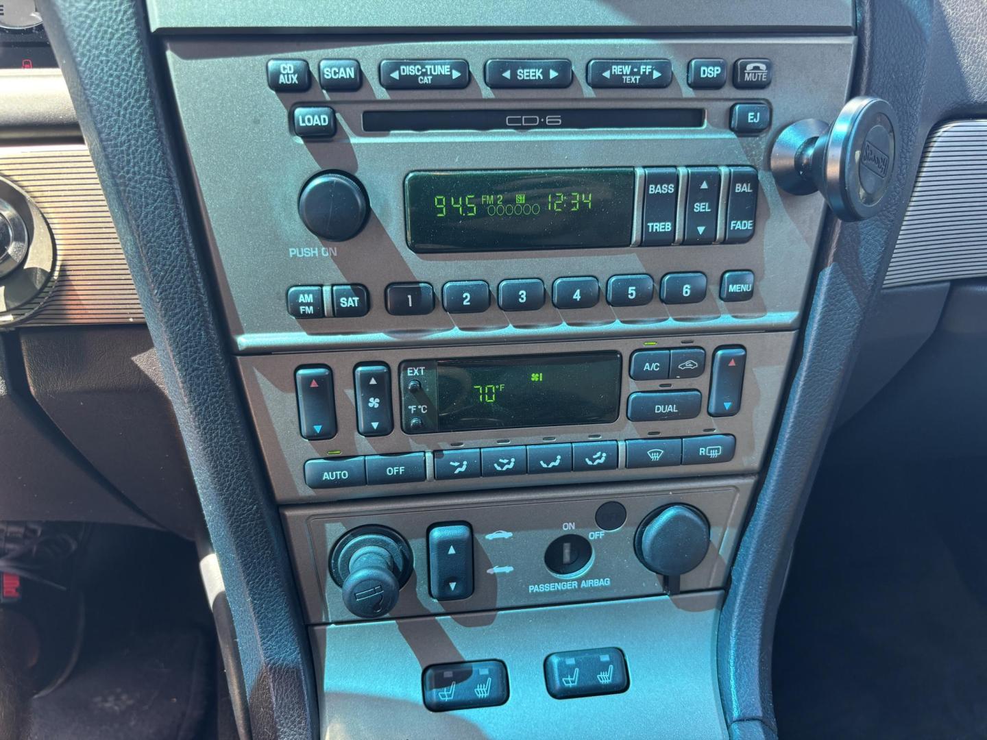 2004 MAROON /BEIGE LEATHER Ford Thunderbird Deluxe (1FAHP60A04Y) with an 3.9L V8 DOHC 32V engine, 5-Speed Automatic Overdrive transmission, located at 11170 Summerlin Square Dr., Fort Myers Beach, FL, 33931, (239) 999-7777, 26.493546, -81.941628 - Photo#42