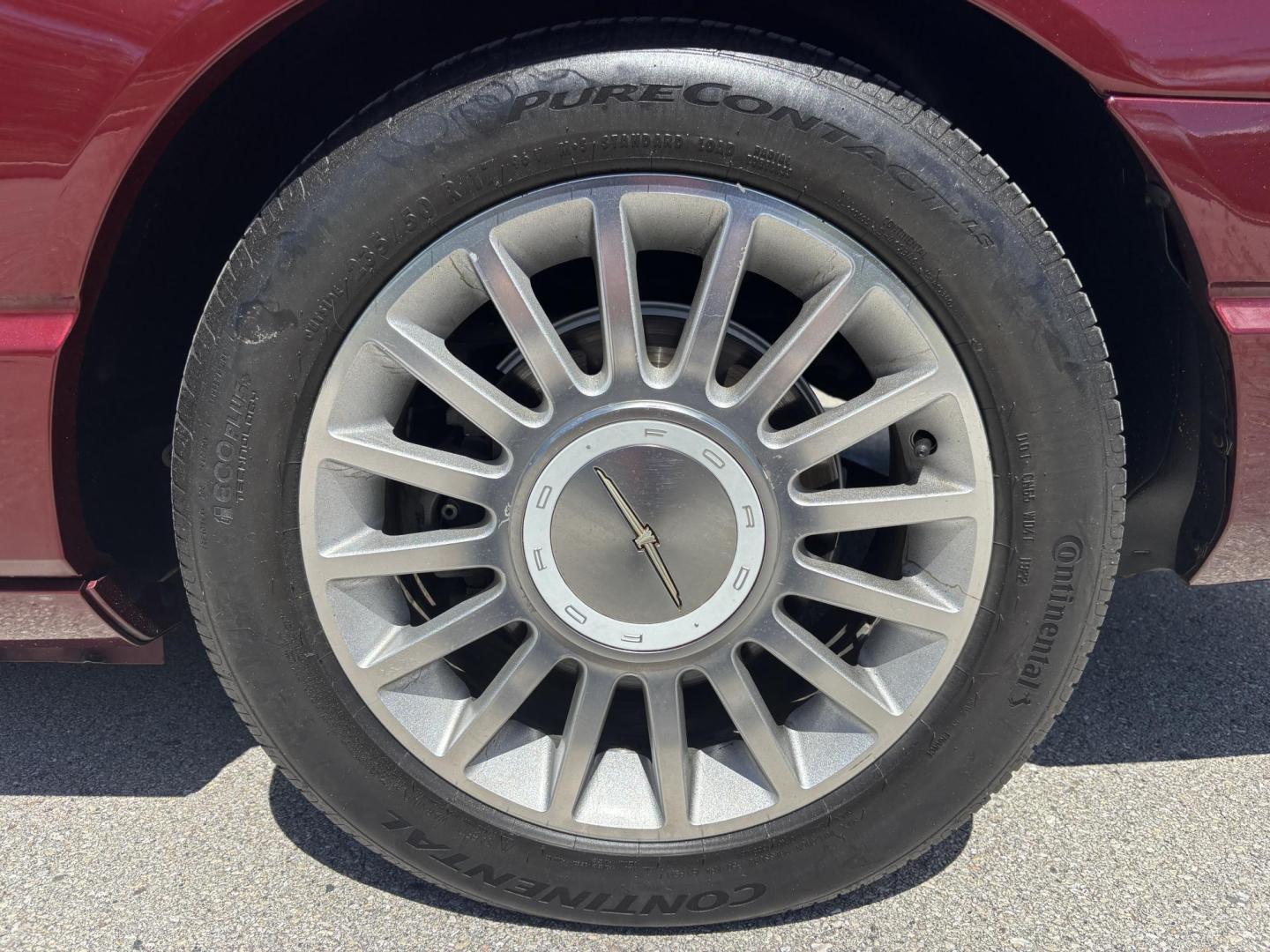 2004 MAROON /BEIGE LEATHER Ford Thunderbird Deluxe (1FAHP60A04Y) with an 3.9L V8 DOHC 32V engine, 5-Speed Automatic Overdrive transmission, located at 11170 Summerlin Square Dr., Fort Myers Beach, FL, 33931, (239) 999-7777, 26.493546, -81.941628 - Photo#52