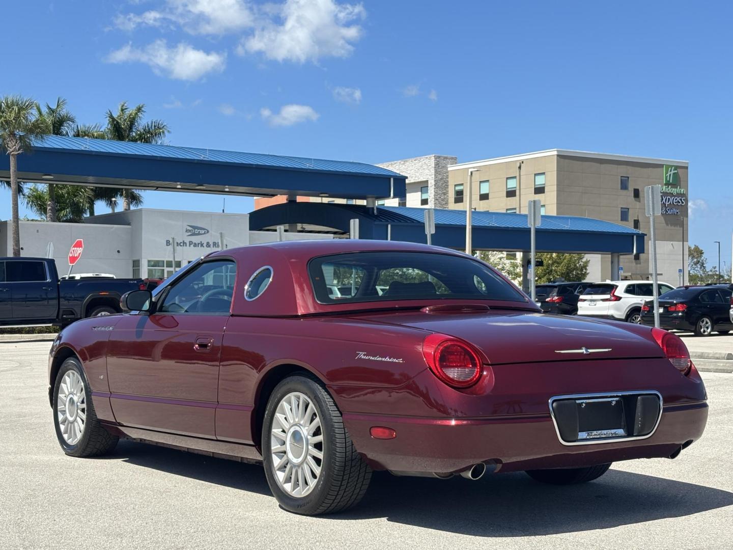 2004 MAROON /BEIGE LEATHER Ford Thunderbird Deluxe (1FAHP60A04Y) with an 3.9L V8 DOHC 32V engine, 5-Speed Automatic Overdrive transmission, located at 11170 Summerlin Square Dr., Fort Myers Beach, FL, 33931, (239) 999-7777, 26.493546, -81.941628 - Photo#8