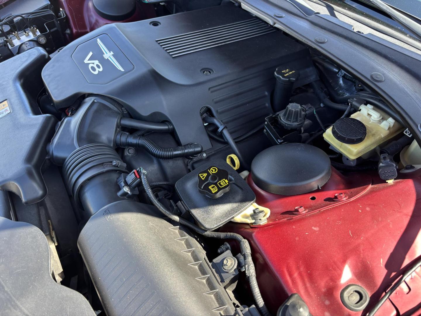 2004 MAROON /BEIGE LEATHER Ford Thunderbird Deluxe (1FAHP60A04Y) with an 3.9L V8 DOHC 32V engine, 5-Speed Automatic Overdrive transmission, located at 11170 Summerlin Square Dr., Fort Myers Beach, FL, 33931, (239) 999-7777, 26.493546, -81.941628 - Photo#47