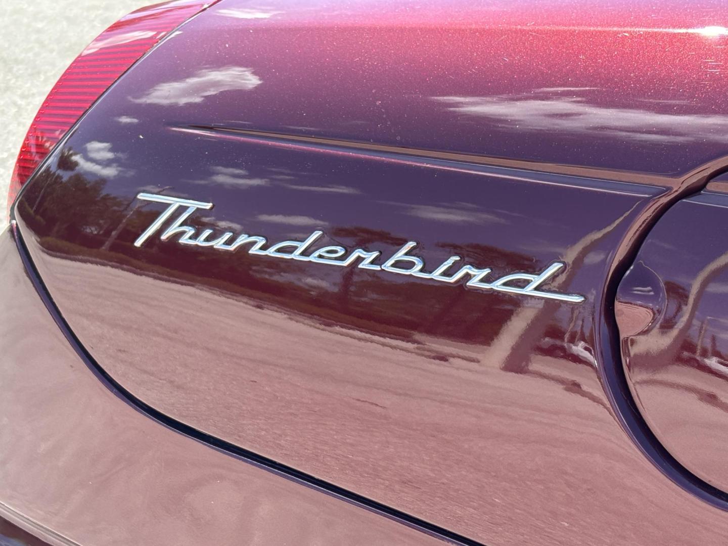 2004 MAROON /BEIGE LEATHER Ford Thunderbird Deluxe (1FAHP60A04Y) with an 3.9L V8 DOHC 32V engine, 5-Speed Automatic Overdrive transmission, located at 11170 Summerlin Square Dr., Fort Myers Beach, FL, 33931, (239) 999-7777, 26.493546, -81.941628 - Photo#31