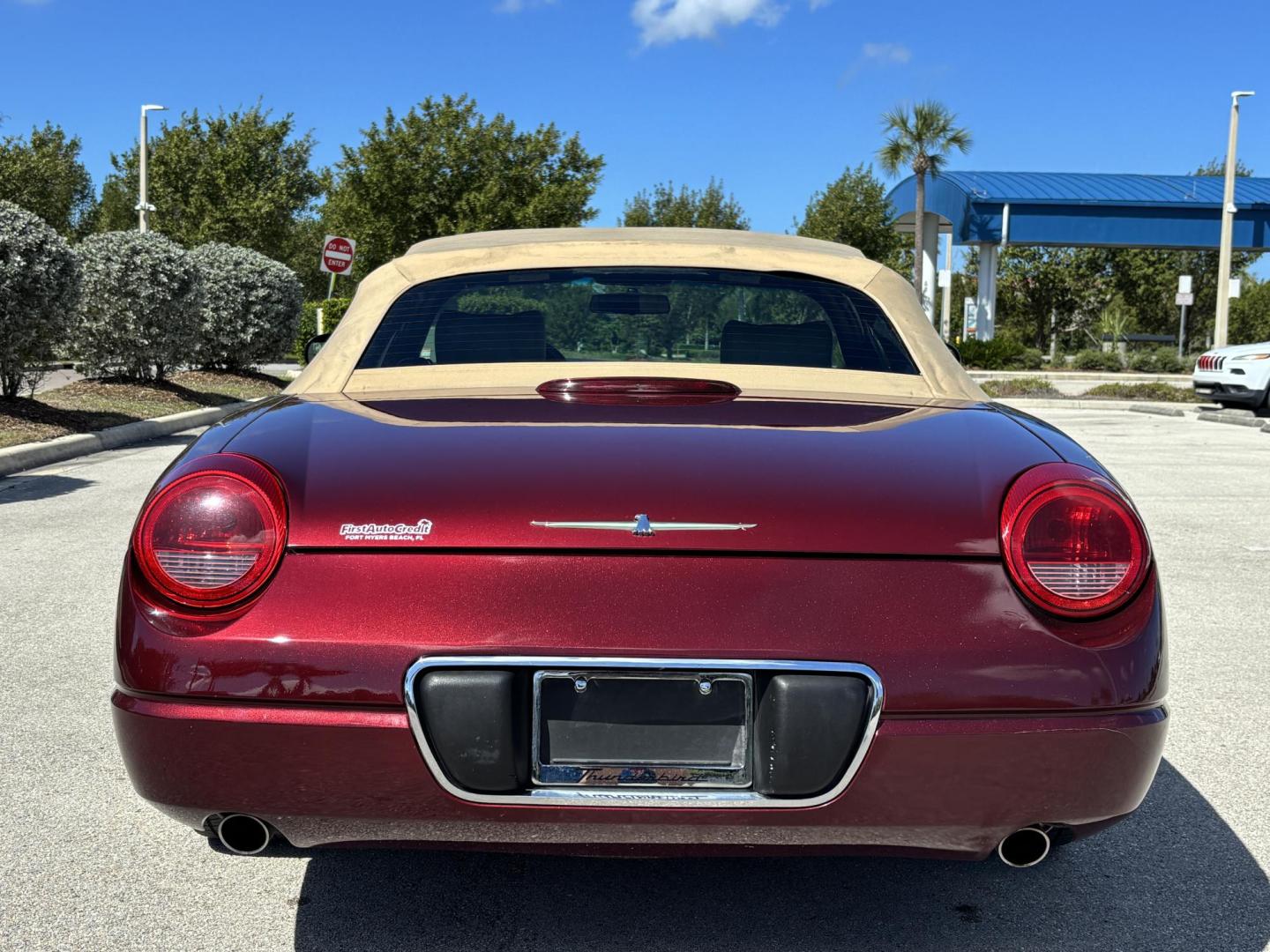 2004 MAROON /BEIGE LEATHER Ford Thunderbird Deluxe (1FAHP60A04Y) with an 3.9L V8 DOHC 32V engine, 5-Speed Automatic Overdrive transmission, located at 11170 Summerlin Square Dr., Fort Myers Beach, FL, 33931, (239) 999-7777, 26.493546, -81.941628 - Photo#16