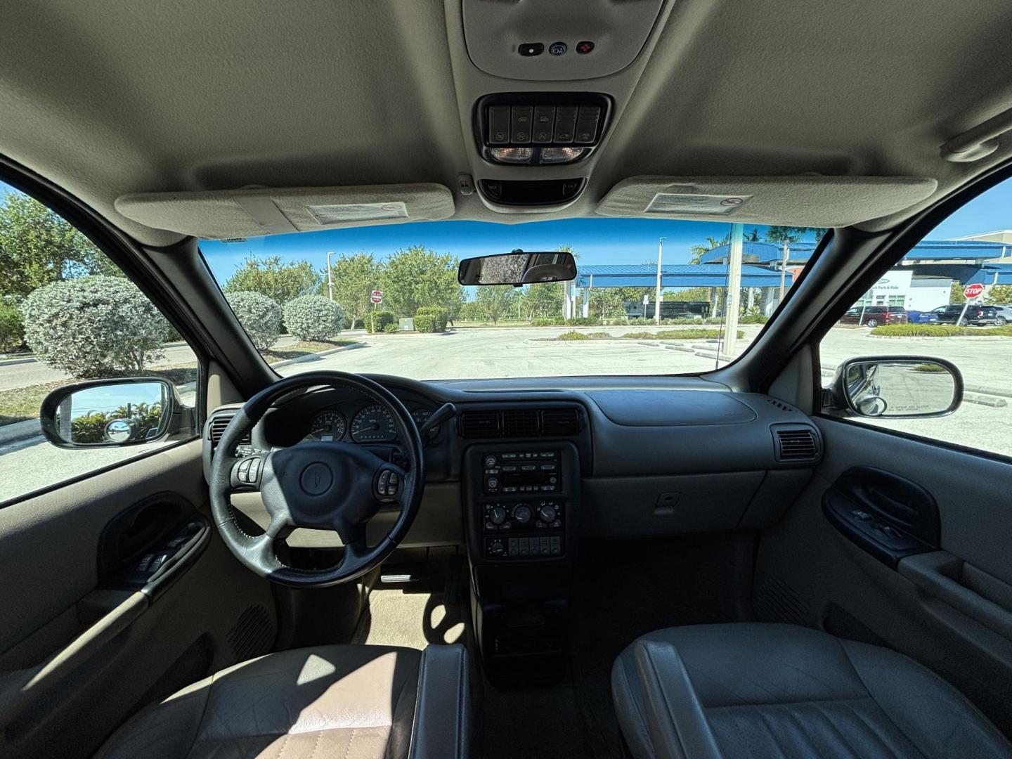 2002 BROWN /BEIGE LEATHER Pontiac Montana 1SA Extended (1GMDX13E42D) with an 3.4L V6 OHV 12V engine, 4-Speed Automatic Overdrive transmission, located at 11170 Summerlin Square Dr., Fort Myers Beach, FL, 33931, (239) 999-7777, 26.493546, -81.941628 - Photo#9
