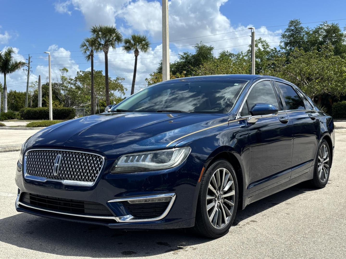 2017 BLUE Lincoln MKZ Select FWD (3LN6L5C98HR) with an 2.0L L4 DOHC 16V engine, 6A transmission, located at 11170 Summerlin Square Dr., Fort Myers Beach, FL, 33931, (239) 999-7777, 26.493546, -81.941628 - Photo#1
