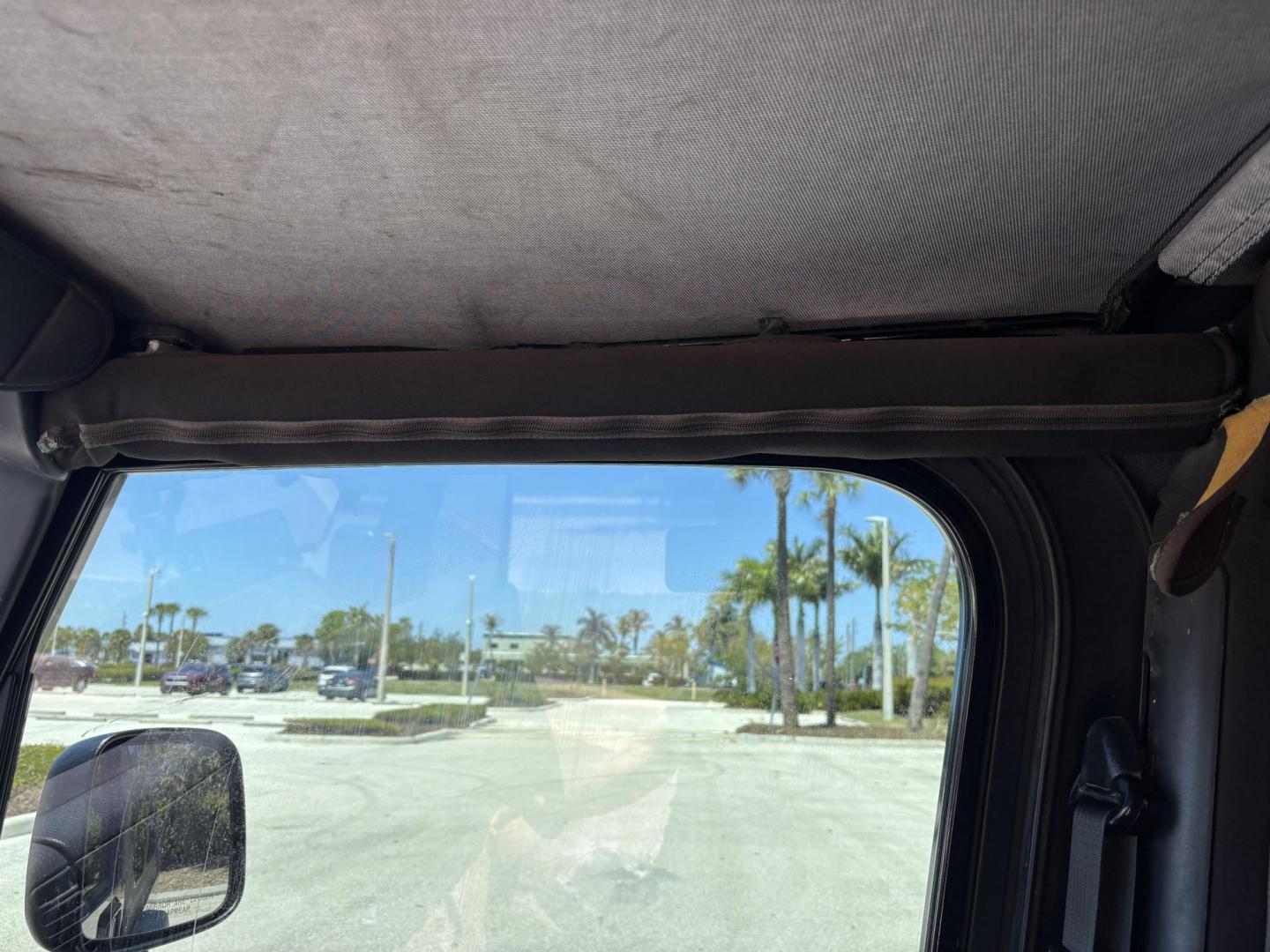 2006 BLACK /CHARCOAL CLOTH Jeep Wrangler Unlimited LJ (1J4FA44S86P) with an 4.0L L6 OHV 12V engine, Automatic transmission, located at 11170 Summerlin Square Dr., Fort Myers Beach, FL, 33931, (239) 999-7777, 26.493546, -81.941628 - Take a look at this iconic 2006 Jeep Wrangler — built for adventure and ready for the Florida lifestyle. This Wrangler delivers the classic Jeep experience with its rugged design, removable top, and go-anywhere capability. Whether you're cruising Fort Myers Beach with the top down or heading of - Photo#22