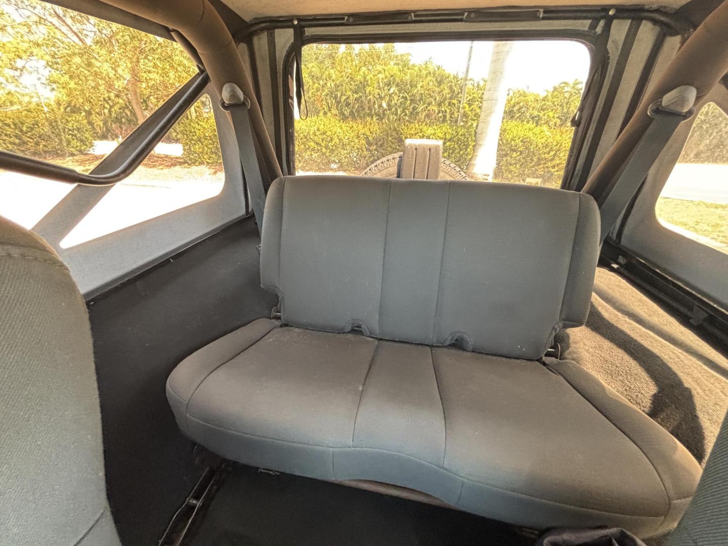 2006 BLACK /CHARCOAL CLOTH Jeep Wrangler Unlimited LJ (1J4FA44S86P) with an 4.0L L6 OHV 12V engine, Automatic transmission, located at 11170 Summerlin Square Dr., Fort Myers Beach, FL, 33931, (239) 999-7777, 26.493546, -81.941628 - Take a look at this iconic 2006 Jeep Wrangler — built for adventure and ready for the Florida lifestyle. This Wrangler delivers the classic Jeep experience with its rugged design, removable top, and go-anywhere capability. Whether you're cruising Fort Myers Beach with the top down or heading of - Photo#18