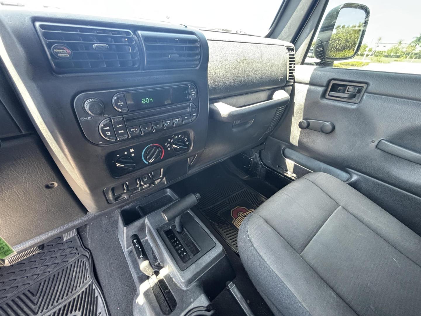 2006 BLACK /CHARCOAL CLOTH Jeep Wrangler Unlimited LJ (1J4FA44S86P) with an 4.0L L6 OHV 12V engine, Automatic transmission, located at 11170 Summerlin Square Dr., Fort Myers Beach, FL, 33931, (239) 999-7777, 26.493546, -81.941628 - Take a look at this iconic 2006 Jeep Wrangler — built for adventure and ready for the Florida lifestyle. This Wrangler delivers the classic Jeep experience with its rugged design, removable top, and go-anywhere capability. Whether you're cruising Fort Myers Beach with the top down or heading of - Photo#14