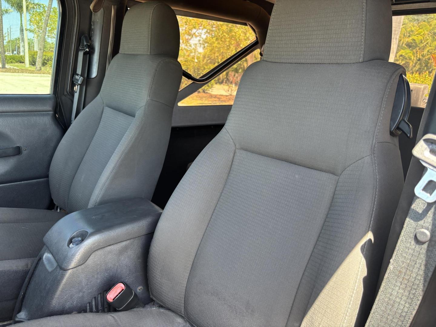 2006 BLACK /CHARCOAL CLOTH Jeep Wrangler Unlimited LJ (1J4FA44S86P) with an 4.0L L6 OHV 12V engine, Automatic transmission, located at 11170 Summerlin Square Dr., Fort Myers Beach, FL, 33931, (239) 999-7777, 26.493546, -81.941628 - Take a look at this iconic 2006 Jeep Wrangler — built for adventure and ready for the Florida lifestyle. This Wrangler delivers the classic Jeep experience with its rugged design, removable top, and go-anywhere capability. Whether you're cruising Fort Myers Beach with the top down or heading of - Photo#13