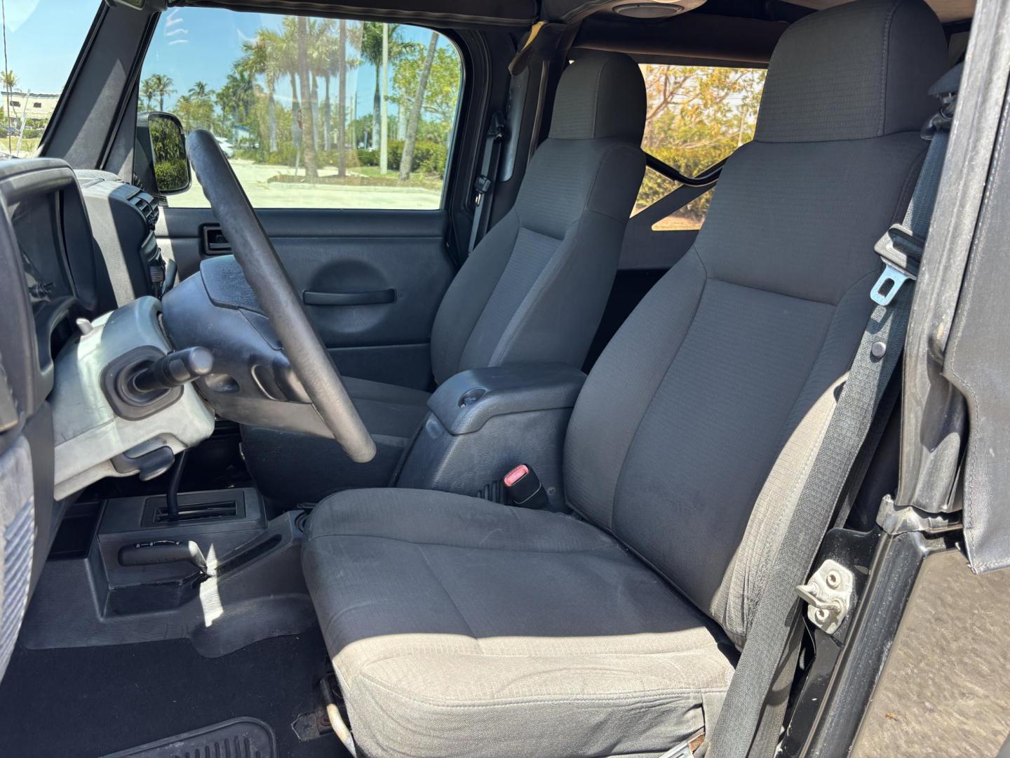 2006 BLACK /CHARCOAL CLOTH Jeep Wrangler Unlimited LJ (1J4FA44S86P) with an 4.0L L6 OHV 12V engine, Automatic transmission, located at 11170 Summerlin Square Dr., Fort Myers Beach, FL, 33931, (239) 999-7777, 26.493546, -81.941628 - Take a look at this iconic 2006 Jeep Wrangler — built for adventure and ready for the Florida lifestyle. This Wrangler delivers the classic Jeep experience with its rugged design, removable top, and go-anywhere capability. Whether you're cruising Fort Myers Beach with the top down or heading of - Photo#12