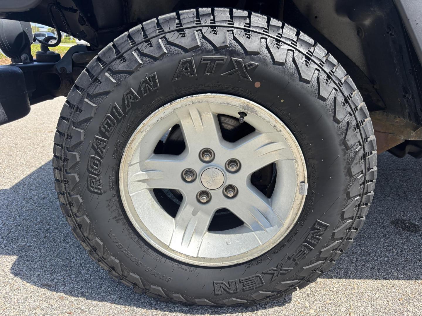 2006 BLACK /CHARCOAL CLOTH Jeep Wrangler Unlimited LJ (1J4FA44S86P) with an 4.0L L6 OHV 12V engine, Automatic transmission, located at 11170 Summerlin Square Dr., Fort Myers Beach, FL, 33931, (239) 999-7777, 26.493546, -81.941628 - Take a look at this iconic 2006 Jeep Wrangler — built for adventure and ready for the Florida lifestyle. This Wrangler delivers the classic Jeep experience with its rugged design, removable top, and go-anywhere capability. Whether you're cruising Fort Myers Beach with the top down or heading of - Photo#35