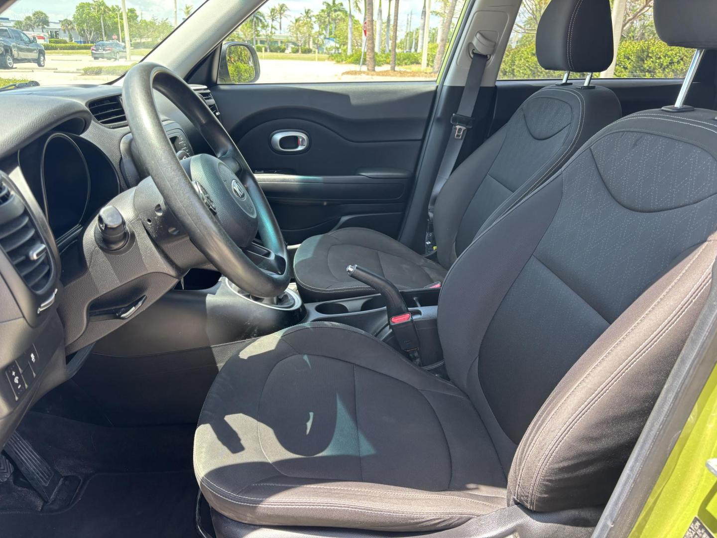 2016 GREEN /BLACK CLOTH Kia Soul (KNDJN2A24G7) with an 1.6L L4 DOHC 16V engine, MANUAL transmission, located at 11170 Summerlin Square Dr., Fort Myers Beach, FL, 33931, (239) 999-7777, 26.493546, -81.941628 - 2016 Kia Soul – Manual Transmission – CARFAX 1 Owner – Only 26,618 Miles – $10,900 Now available at First Auto Credit Fort Myers Beach is this low-mileage 2016 Kia Soul with a manual transmission, CARFAX 1-owner history, and only 26,618 miles. If you are looking for an affordable used hat - Photo#9