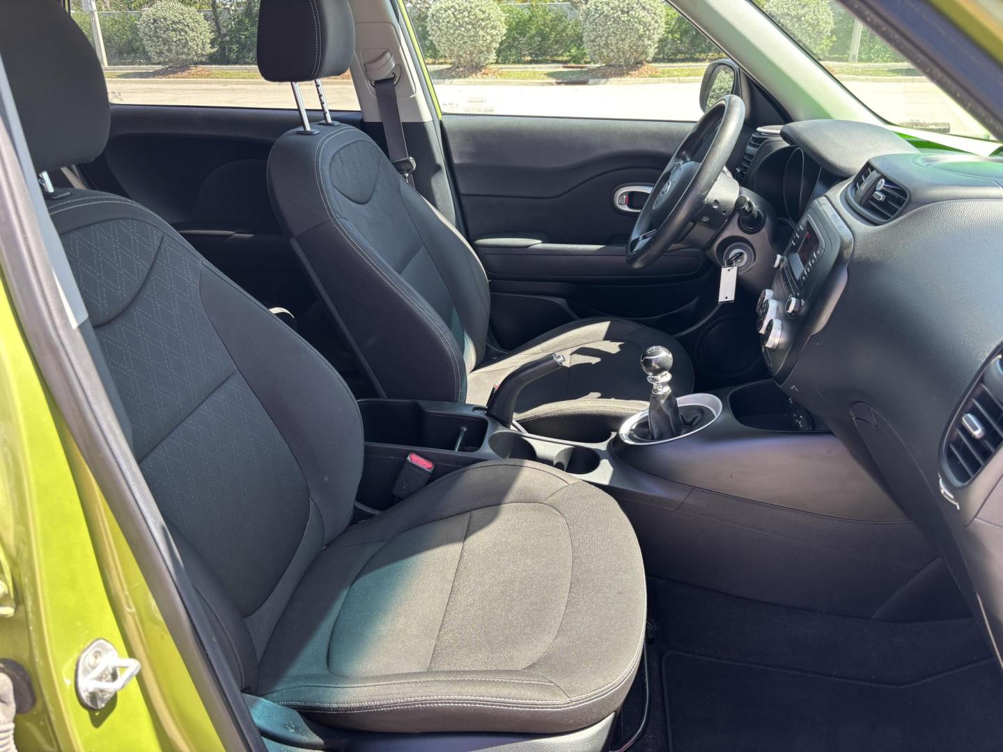 2016 GREEN /BLACK CLOTH Kia Soul (KNDJN2A24G7) with an 1.6L L4 DOHC 16V engine, MANUAL transmission, located at 11170 Summerlin Square Dr., Fort Myers Beach, FL, 33931, (239) 999-7777, 26.493546, -81.941628 - 2016 Kia Soul – Manual Transmission – CARFAX 1 Owner – Only 26,618 Miles – $10,900 Now available at First Auto Credit Fort Myers Beach is this low-mileage 2016 Kia Soul with a manual transmission, CARFAX 1-owner history, and only 26,618 miles. If you are looking for an affordable used hat - Photo#13