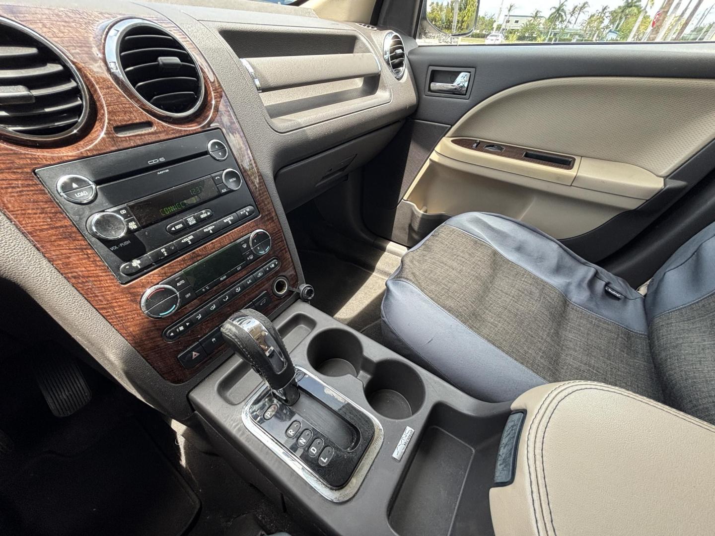 2008 RED /BEIGE LEATHER Ford Taurus X Eddie Bauer AWD (1FMDK07W58G) with an 3.5L V6 DOHC 24V engine, 6-Speed Automatic Overdrive transmission, located at 11170 Summerlin Square Dr., Fort Myers Beach, FL, 33931, (239) 999-7777, 26.493546, -81.941628 - Photo#11