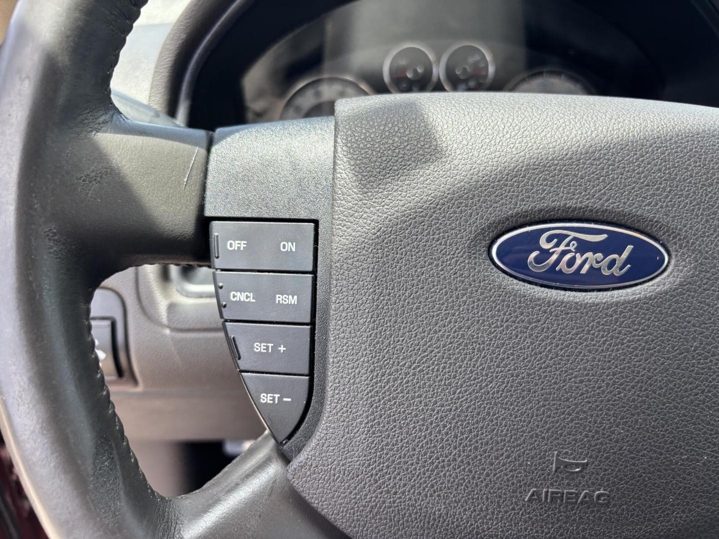 2008 RED /BEIGE LEATHER Ford Taurus X Eddie Bauer AWD (1FMDK07W58G) with an 3.5L V6 DOHC 24V engine, 6-Speed Automatic Overdrive transmission, located at 11170 Summerlin Square Dr., Fort Myers Beach, FL, 33931, (239) 999-7777, 26.493546, -81.941628 - Photo#26