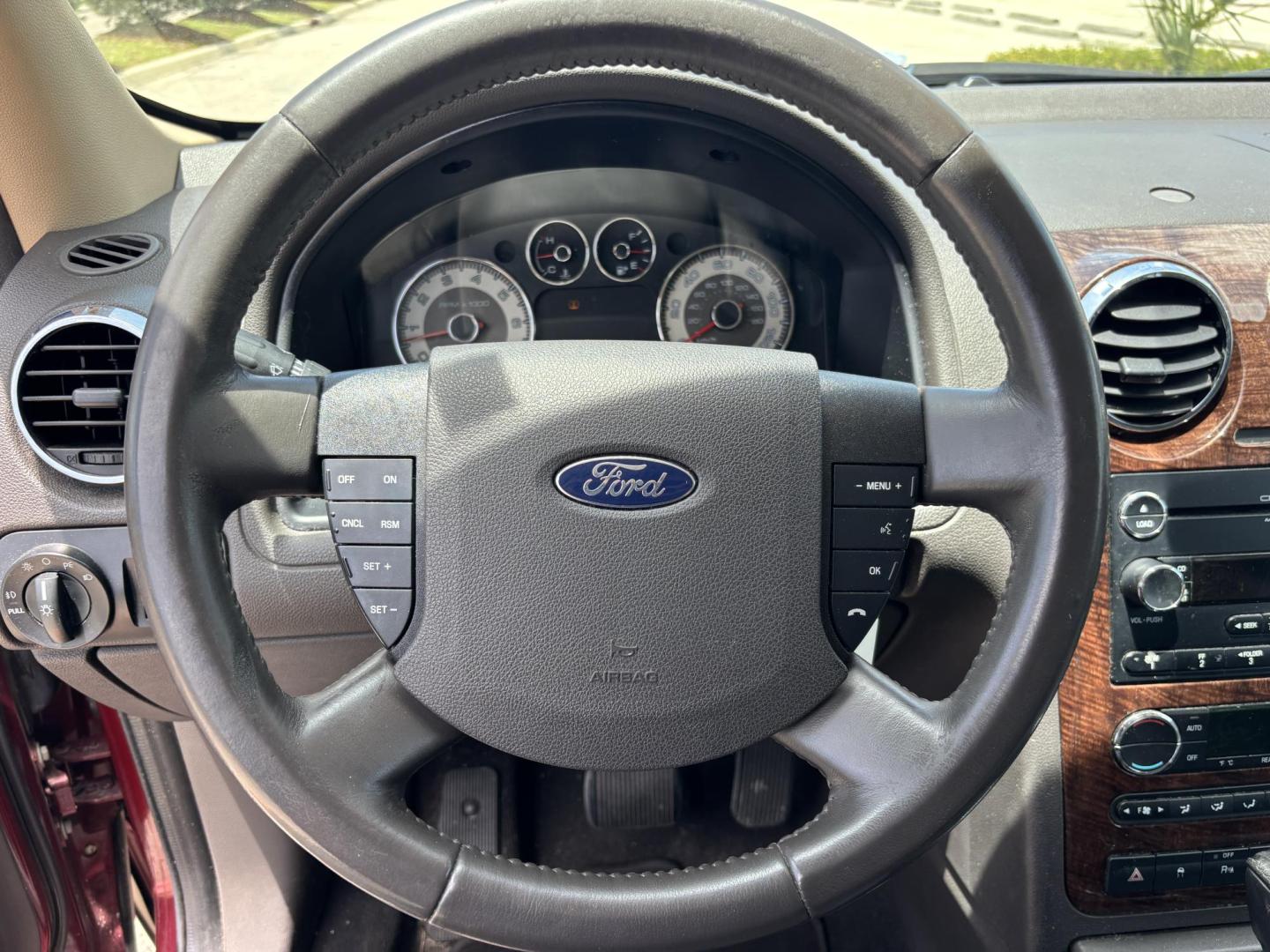 2008 RED /BEIGE LEATHER Ford Taurus X Eddie Bauer AWD (1FMDK07W58G) with an 3.5L V6 DOHC 24V engine, 6-Speed Automatic Overdrive transmission, located at 11170 Summerlin Square Dr., Fort Myers Beach, FL, 33931, (239) 999-7777, 26.493546, -81.941628 - Photo#23