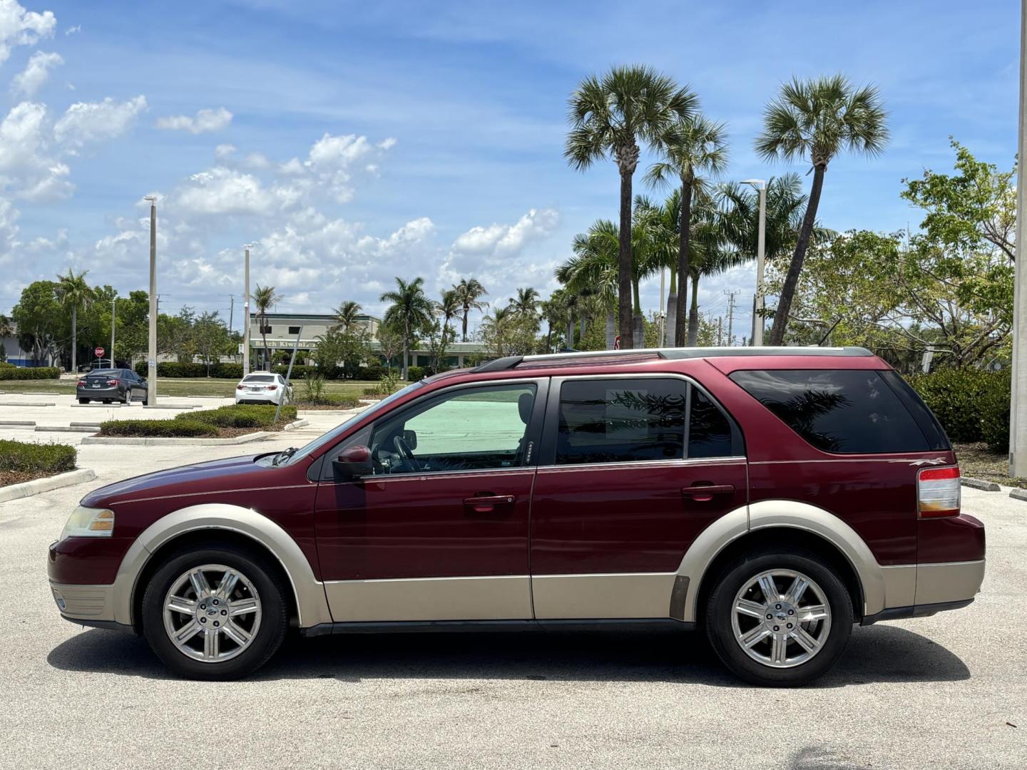 2008 RED /BEIGE LEATHER Ford Taurus X Eddie Bauer AWD (1FMDK07W58G) with an 3.5L V6 DOHC 24V engine, 6-Speed Automatic Overdrive transmission, located at 11170 Summerlin Square Dr., Fort Myers Beach, FL, 33931, (239) 999-7777, 26.493546, -81.941628 - Photo#8