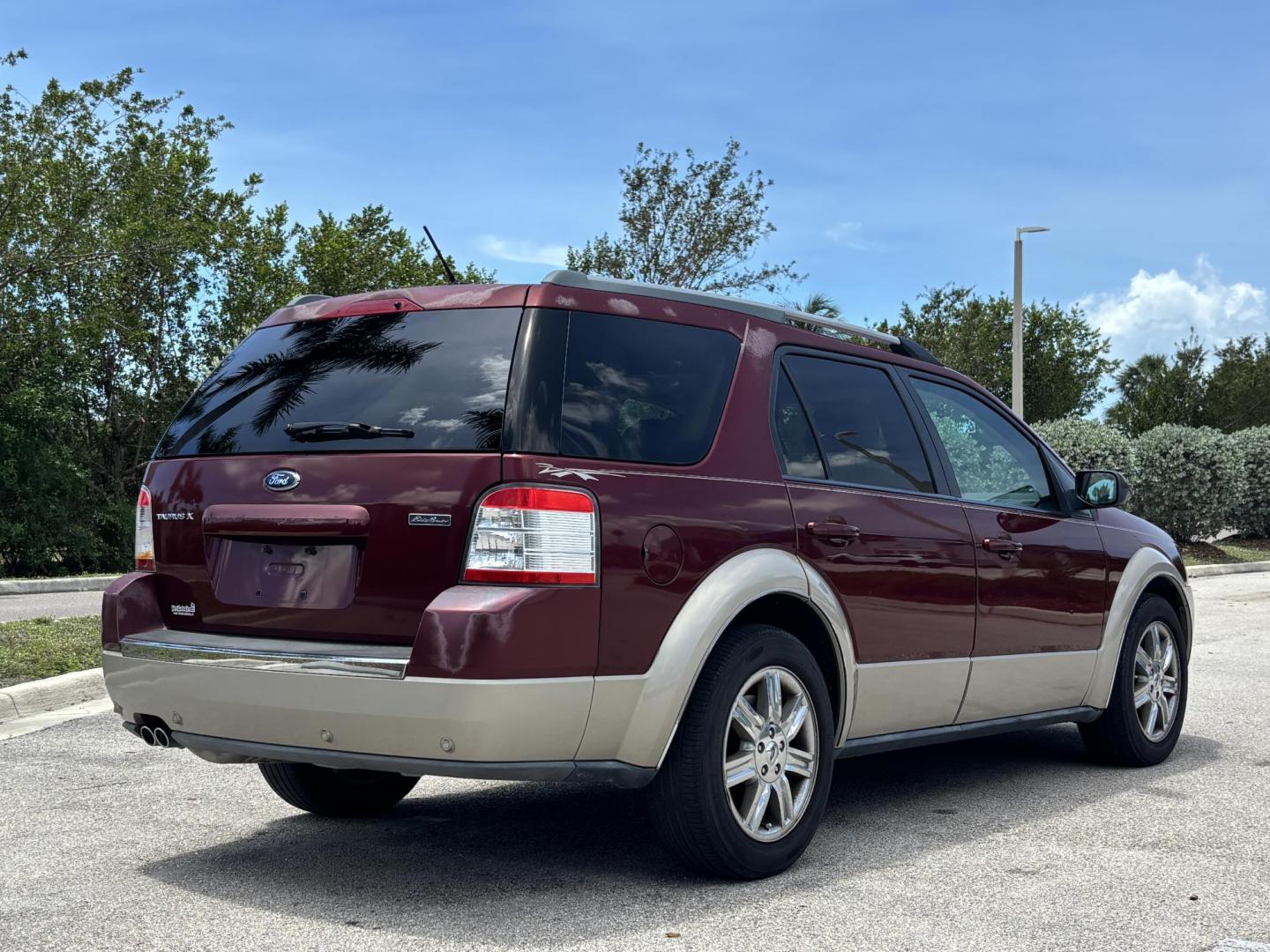 2008 RED /BEIGE LEATHER Ford Taurus X Eddie Bauer AWD (1FMDK07W58G) with an 3.5L V6 DOHC 24V engine, 6-Speed Automatic Overdrive transmission, located at 11170 Summerlin Square Dr., Fort Myers Beach, FL, 33931, (239) 999-7777, 26.493546, -81.941628 - Photo#7