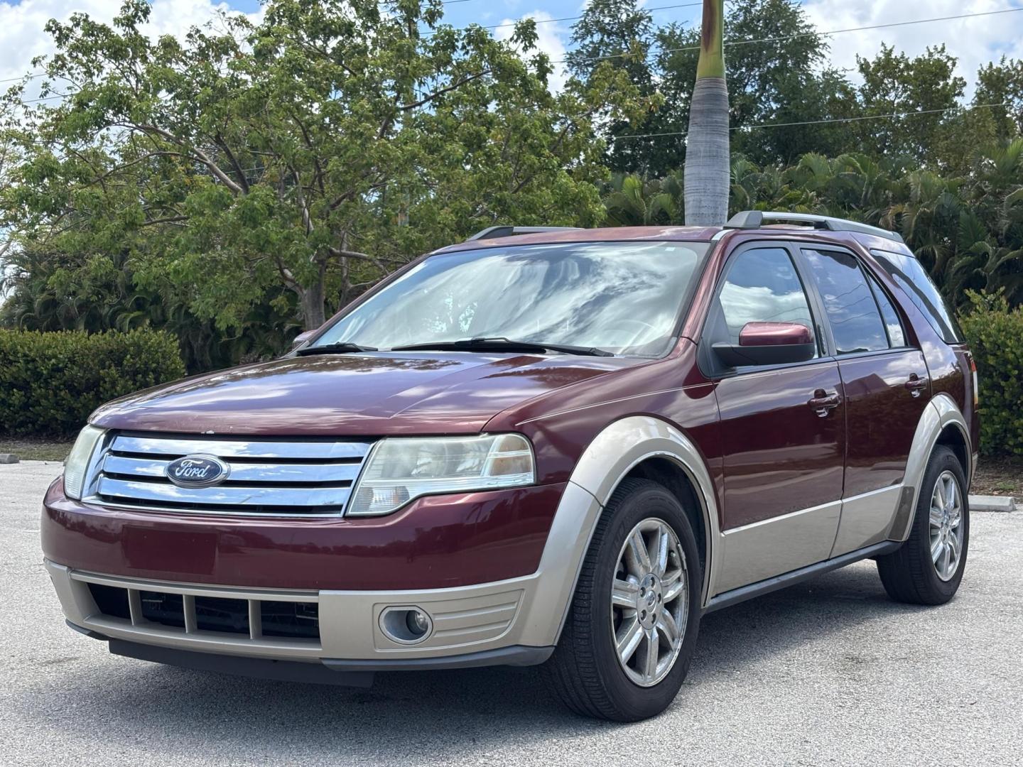 2008 RED /BEIGE LEATHER Ford Taurus X Eddie Bauer AWD (1FMDK07W58G) with an 3.5L V6 DOHC 24V engine, 6-Speed Automatic Overdrive transmission, located at 11170 Summerlin Square Dr., Fort Myers Beach, FL, 33931, (239) 999-7777, 26.493546, -81.941628 - Photo#1